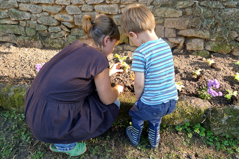 Random image: Konrad and Lena planting Lettuce